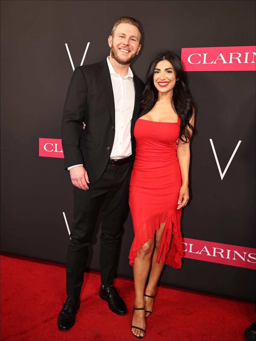 Entrepreneur Ryan White, founder of Social Revelation, with wife Nadia White on the red carpet at the Clarins Formula 1 event in Austin, Texas.